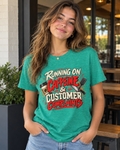 Woman outside a cafe wearing a teal Chef Diablo Running on Caffeine & Customer Complaints t-shirt