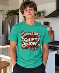 Man in a kitchen wearing a teal Chef Diablo Another Day, Another Shift Show t-shirt